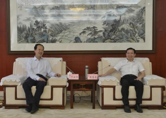 丁焰章拜會南昌市委副書記、市長黃喜忠